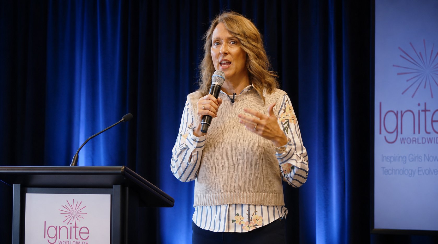 Julie Averill delivering a keynote at Ignite Worldwide